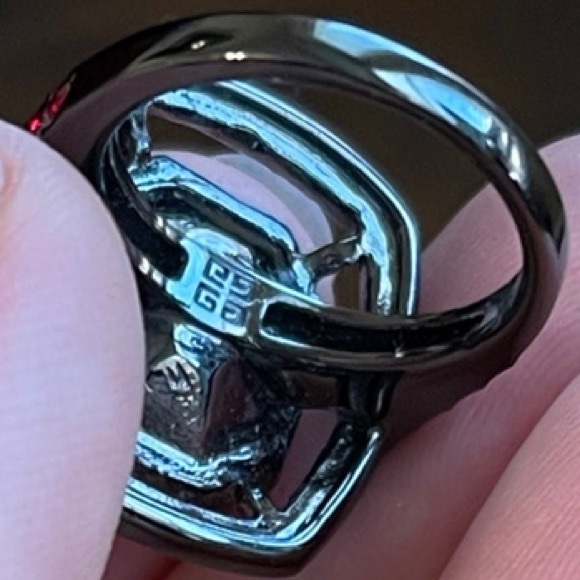 Givenchy Red Crystal
Ring in gunmetal setting. Size 6.75 - Picture 9 of 11
